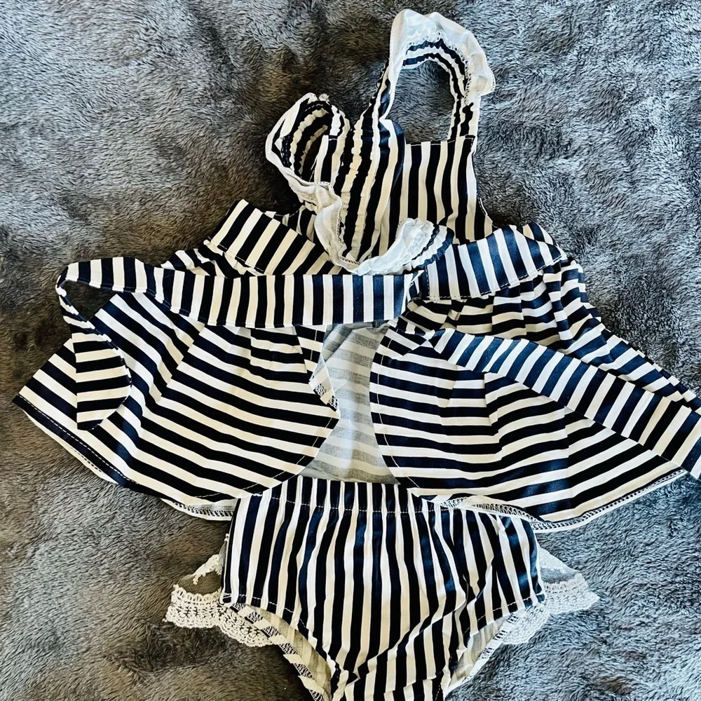 New without tags black and white striped matching top and shorts size 9-12M